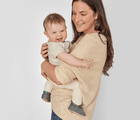 Mom carrying baby wearing Ten Little Everyday Baby Booties - Heather Gray. Available at www.tenlittle.com