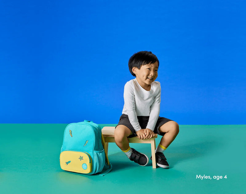 Boy age 4 sitting wearing Ten Little Everyday Original - Space Black. Available at www.tenlittle.com