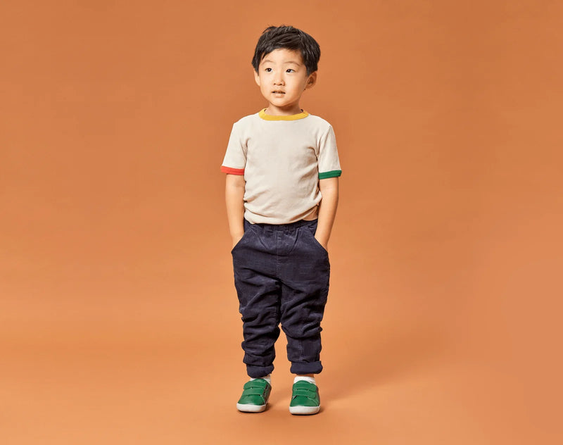 Boy wearing Ten Little Everyday Original - Emerald Green. Available at www.tenlittle.com
