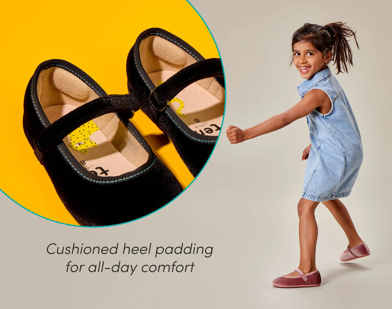 Split view close up of cushioned heel padding and child wearing Ten Little Velvet Ballet Flats - Classic Black and Dusty Rose. Available from www.tenlittle.com