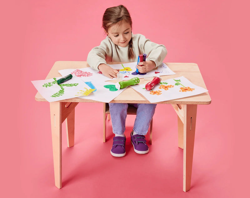 Girl coloring wearing Ten Little Everyday Original - Power Purple. Available at www.tenlittle.com