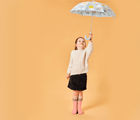 Girl holding umbrella wearing Ten Little Rain Boots - Pink. Available at www.tenlittle.com