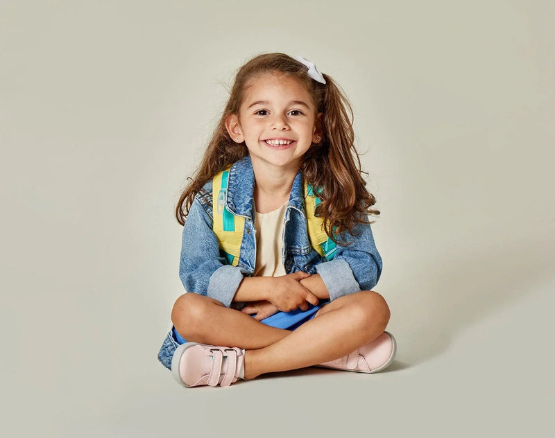 Girl sitting wearing Ten Little Everyday Original - Blush Pink. Available at www.tenlittle.com