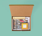 Inside the box - Eco-kids Activity Craft Kit -Includes: Art pad, 2 Pencils, 2 Erasers, 1 Sharpener, Box of crayons and a pencil case ruler. Available at www.tenlittle.com