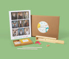 Eco-kids Activity Craft Kit -Includes: Art pad, 2 Pencils, 2 Erasers, 1 Sharpener, Box of crayons and a pencil case ruler. Available at www.tenlittle.com