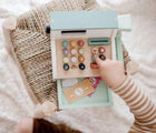 Baby playing with Tender Leaf General Store Cash Register - Available at www.tenlittle.com