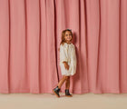 Girl wearing Ten Little Chelsea Boots - Metallic Gray. Available at www.tenlittle.com