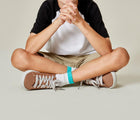 Boy wearing Ten Little Classic Sneakers Youth - Mocha Brown. Available at www.tenlittle.com