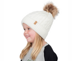 Child wearing Jan & Jul Cable Knit Beanie in cream. Available from tenlittle.com