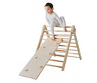 Child playing on the Piccalio Climber Pikler Triangle Set. Available from www.tenlittle.com