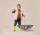Little boy Holding Ten Little Color Changing Umbrella Space - Available at www.tenlittle.com
