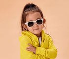 Girl wearing Ten Little Sunglasses - White. Available at www.tenlittle.com