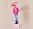 Girl holding umbrella wearing Ten Little Rain Boots - Navy. Available at www.tenlittle.com
