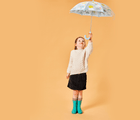 Girl holding umbrella wearing Ten Little Rain Boots - Teal. Available at www.tenlittle.com