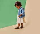 Girl wearing Ten Little Mary Janes - Classic Black. Available at www.tenlittle.com