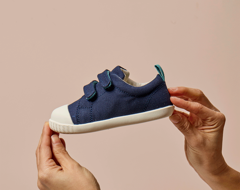 GIF flexing Ten Little Eco Canvas Sneakers - Navy Blue. Available at www.tenlittle.com