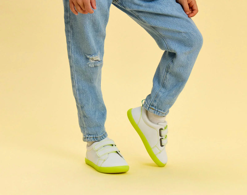 Child wearing Ten Little Everyday Original - Neon Glow - Neon Yellow. Available at www.tenlittle.com