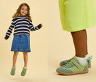 Split view of children wearing Ten Little Retro Suede Sneakers - Retro Green. Available at www.tenlittle.com