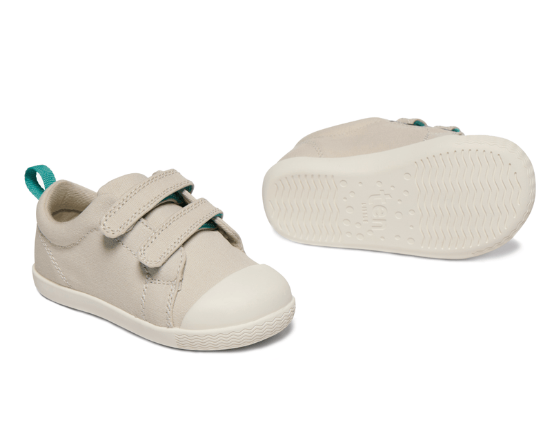 Side and bottom of shoe view of Ten Little Eco Canvas Sneakers - Gray Beige. Available at www.tenlittle.com