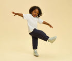 Child wearing Ten Little Everyday High Top - Moondust Silver. Available at www.tenlittle.com