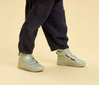 Child wearing Ten Little Everyday High Top - Moondust Silver. Available at www.tenlittle.com