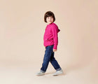 Child wearing Ten Little Slip-On Sneakers - Moondust Silver. Available at www.tenlittle.com