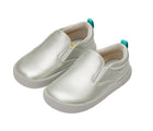 Side and front view of Ten Little Slip-On Sneakers - Moondust Silver. Available at www.tenlittle.com
