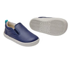 Front and bottom of shoe view of Ten Little Slip-On Sneakers - Navy Blue. Available at www.tenlittle.com