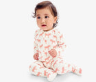 Baby sitting wearing Primary Baby Onesie PJs - 2 Pack - Blossom Zebras. Available at www.tenlittle.com