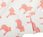 Close up pattern and material of Primary Baby Onesie PJs - 2 Pack - Blossom Zebras. Available at www.tenlittle.com