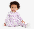 Baby sitting wearing Primary Baby Onesie PJs - 2 Pack - Lavender Elephants. Available at www.tenlittle.com