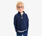 Boy wearing Primary French Terry Quarter Zip Sweatshirt - Navy. Available at www.tenlittle.com
