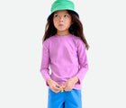 Child wearing Primary Long Sleeve Rash Guard - Lilac. Available at www.tenlittle.com