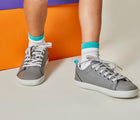 Boy wearing Ten Little Classic Sneakers Youth - Steel Gray. Available at www.tenlittle.com