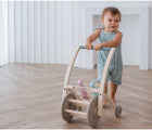 Baby playing Plan Toys Woodpecker Walker - Available at www.tenlittle.com