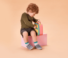 Boy using Ten Little Insulated Recycled Lunch Box - Pink & Yellow. Available at www.tenlittle.com