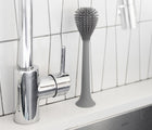 Ezpz gray bottle brush at sink. Available from tenlittle.com