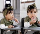 Child using the mini development tool from ezpz Oral Development Tools set. Available from tenlittle.com