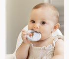 Child using the mini development tool from ezpz Oral Development Tools in petwer. Available from tenlittle.com