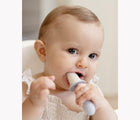 Child using ezpz Tiny Pops. Available from tenlittle.com