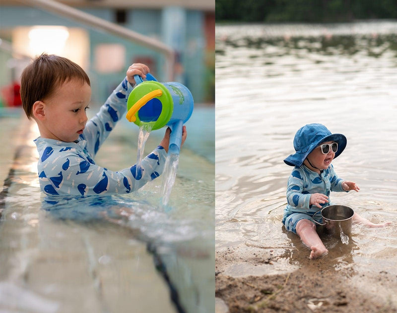 Two children playing in water wearing Jan & Jul Long Sleeve UV Sun Suit in Whale. Available from tenlittle.com