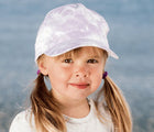 Little Girl Wearing Ten Little Baseball Cap Lavender Tie Dye - Available at www.tenlittle.com