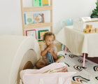 Child Playing with Bloomere Back to School Set Portable Bedding Set - Pink Blush- Available at www.tenlittle.com