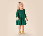 Girl wearing Ten Little Recycled Canvas Shoes - Mellow Yellow in green dress. Available at www.tenlittle.com