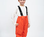 Boy wearing Therm Snowrider Convertible Snow Pants - Flame - Available at www.tenlittle.com
