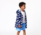 Kid wearing Snapper Rock - Fleece Lined Recycled Waterproof Raincoat - Mountain - Available at www.tenlittle.com