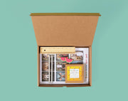 Inside the box - Eco-kids Activity Craft Kit -Includes: Art pad, 2 Pencils, 2 Erasers, 1 Sharpener, Box of crayons and a pencil case ruler. Available at www.tenlittle.com