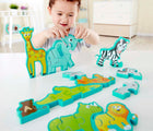 Baby playing with Hape Alphabet & Animal Puzzle - 26 Pieces - Available at www.tenlittle.com