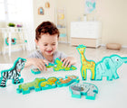 Baby playing Hape Alphabet & Animal Puzzle - 26 Pieces - Available at www.tenlittle.com