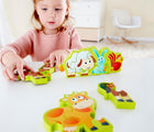 Girl playing Hape Numbers & Farm Animals Puzzle - 10 Pieces - Available at www.tenlittle.com